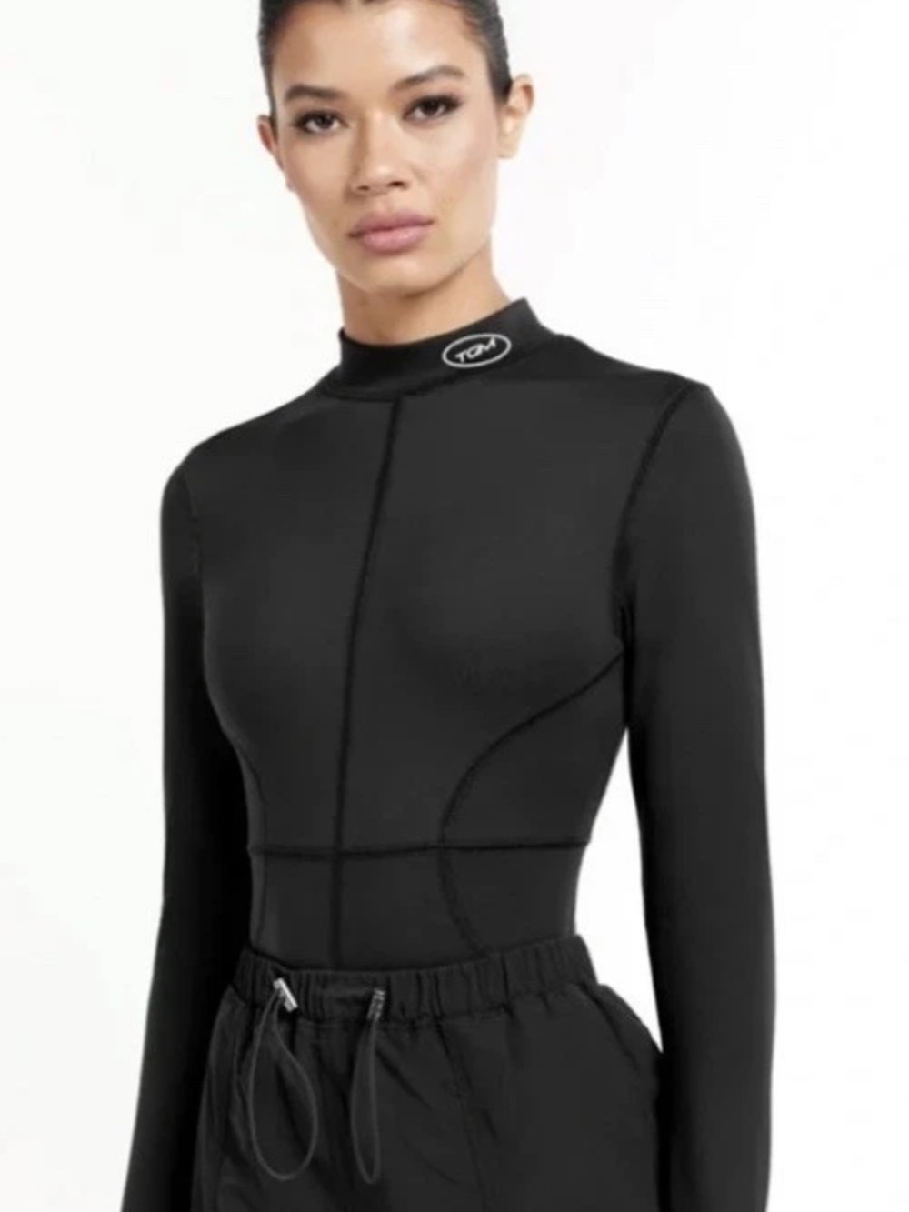 NWT!  The Giving Movement Activewear Long Sleeve Bodysuit BROWN Women Size LARGE